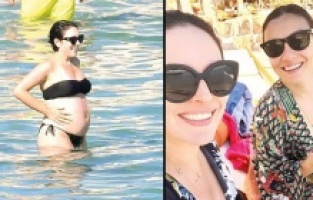 Ezgi Mola büyüyen karnıyla dikkat çekti